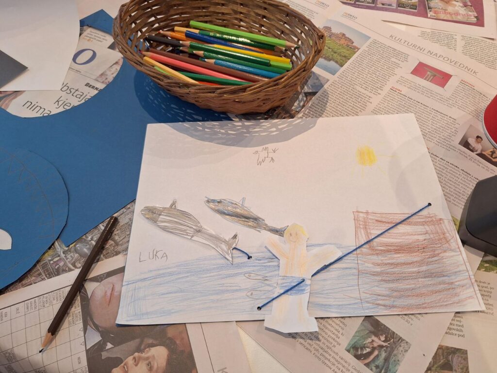 Otroška slika morja in rib.