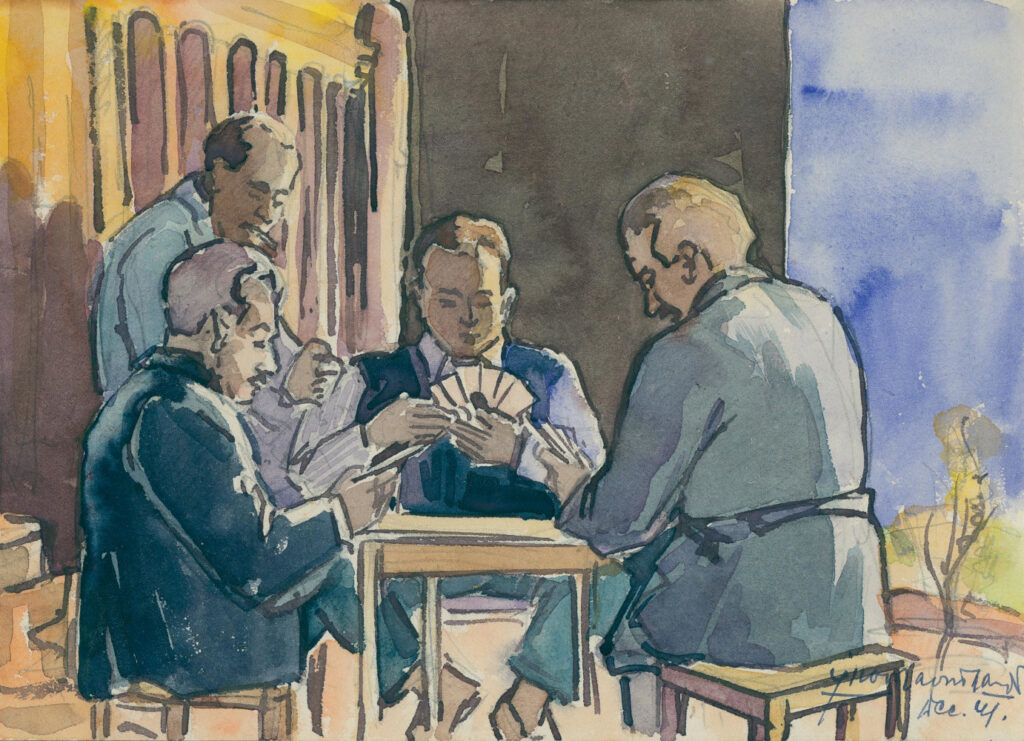 Moški med kartanjem.